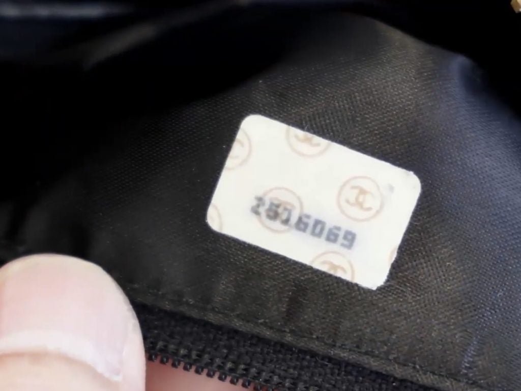 Vintage Chanel handbag interior with serial number